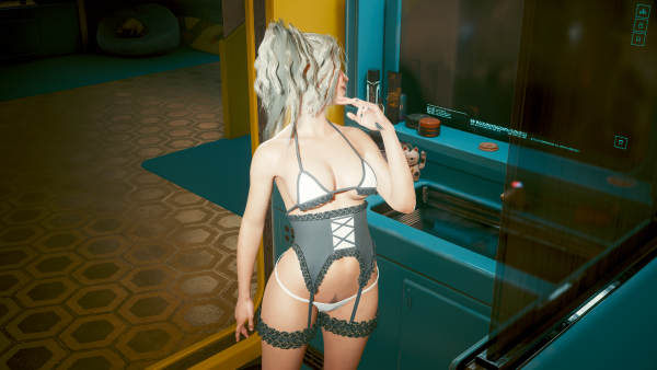 Ви в зеркале любуется своей попой.